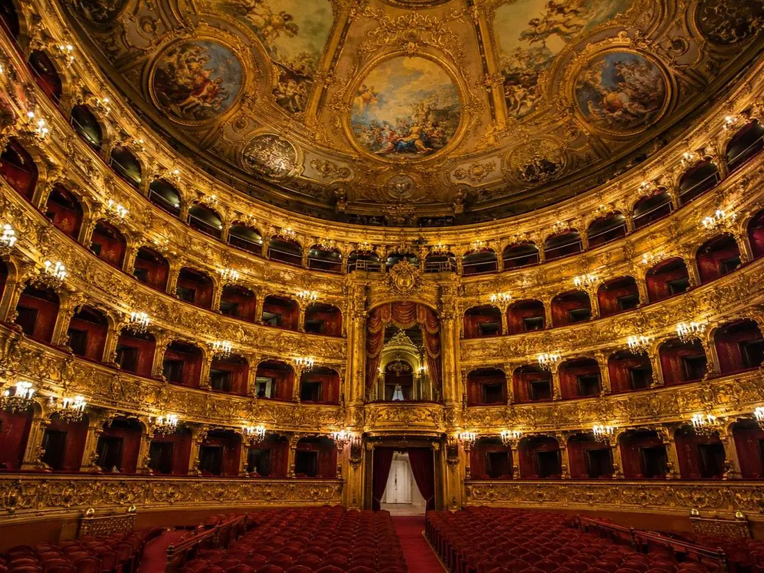 The auditorium: tiered boxes and gilded railings